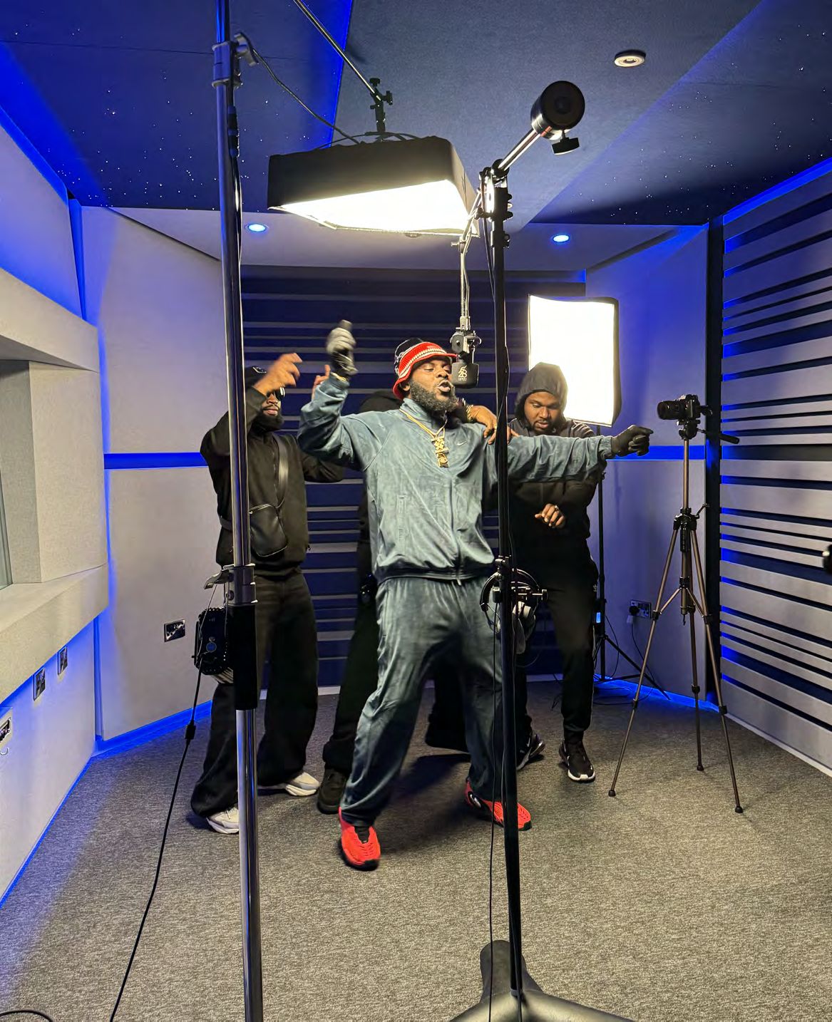 An artist during a promotional studio shoot