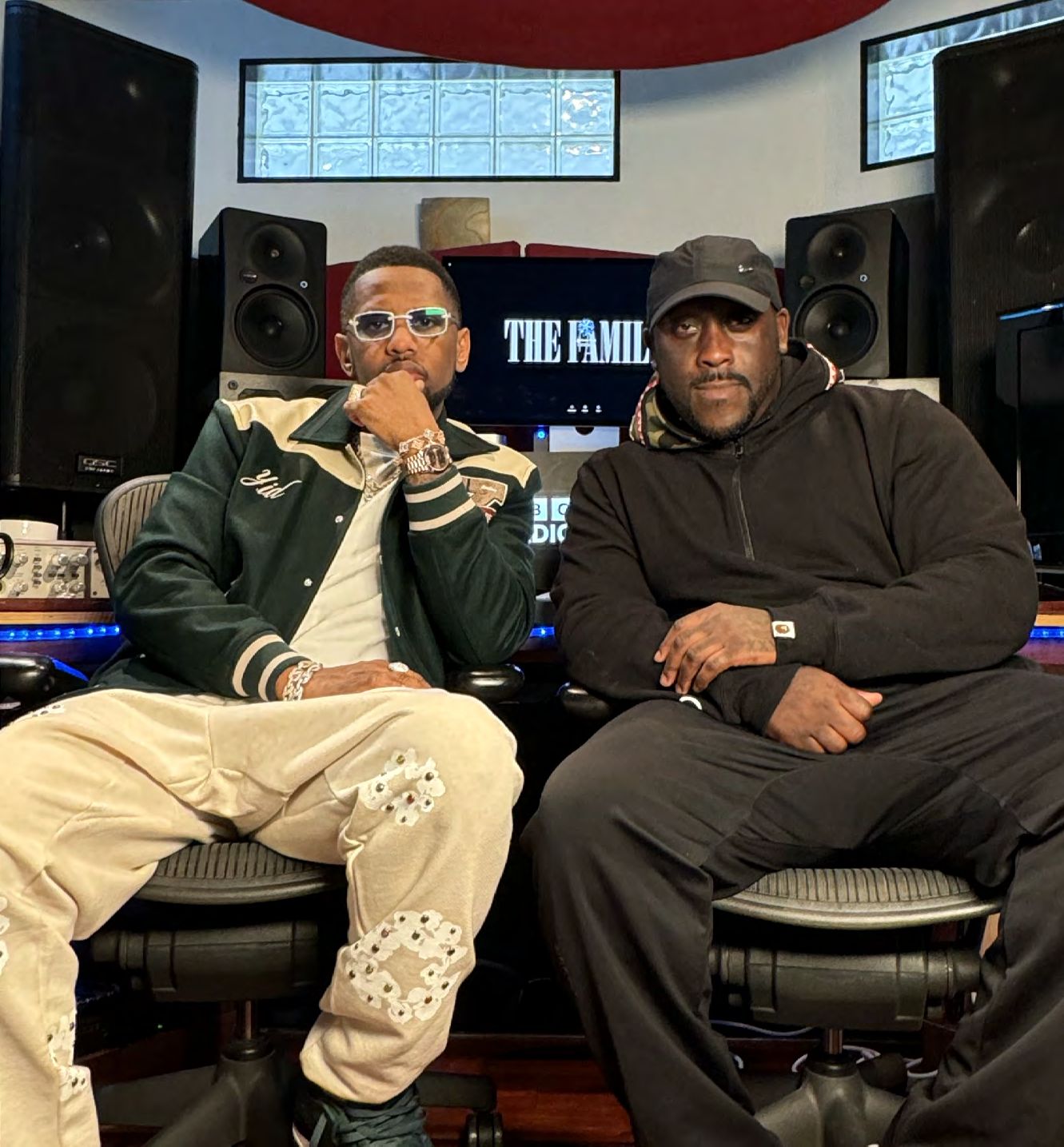 Two guests taking part in a studio recording