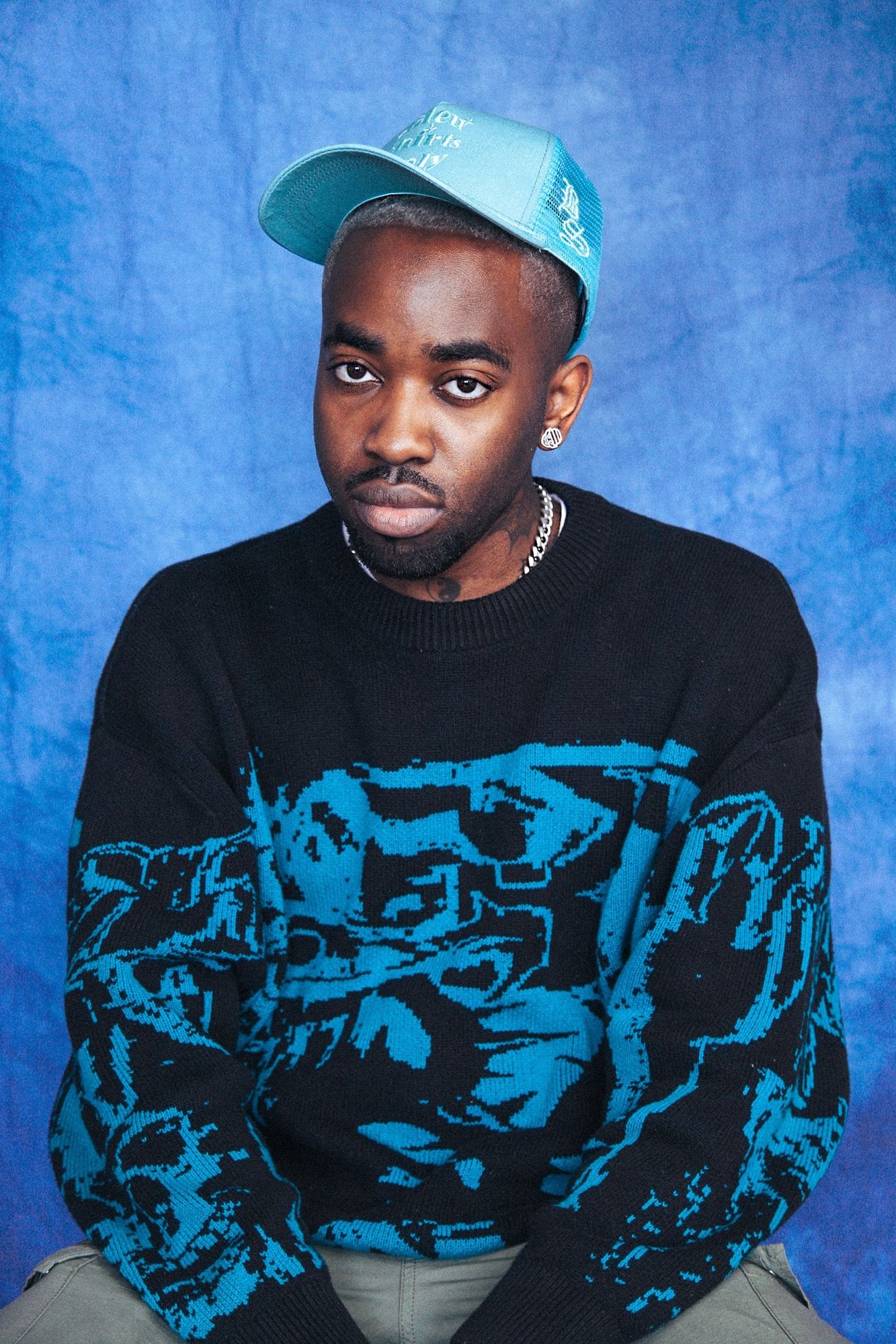 Len promotional portrait