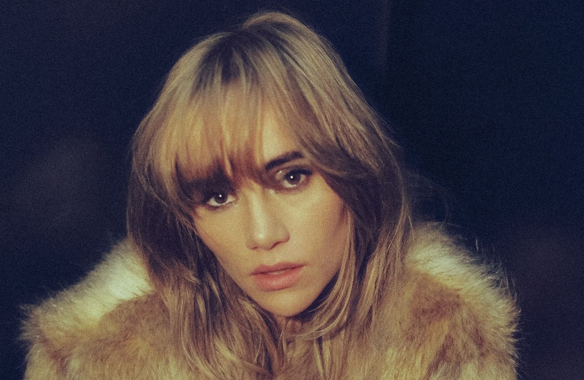 Suki Waterhouse promotional portrait