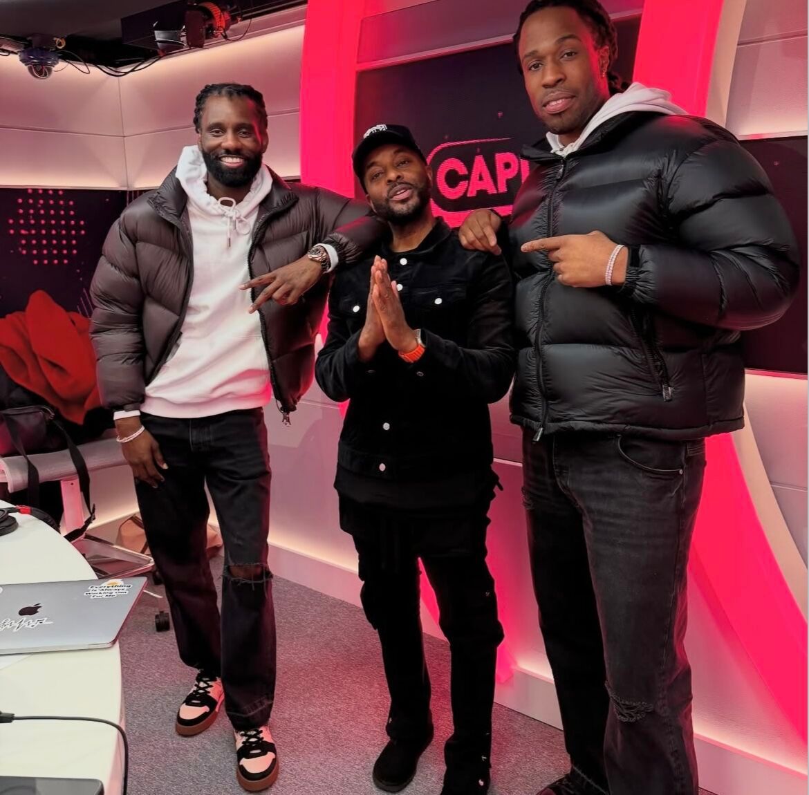 Wretch 32 and Avelino with a presenter in the Capital XTRA studio